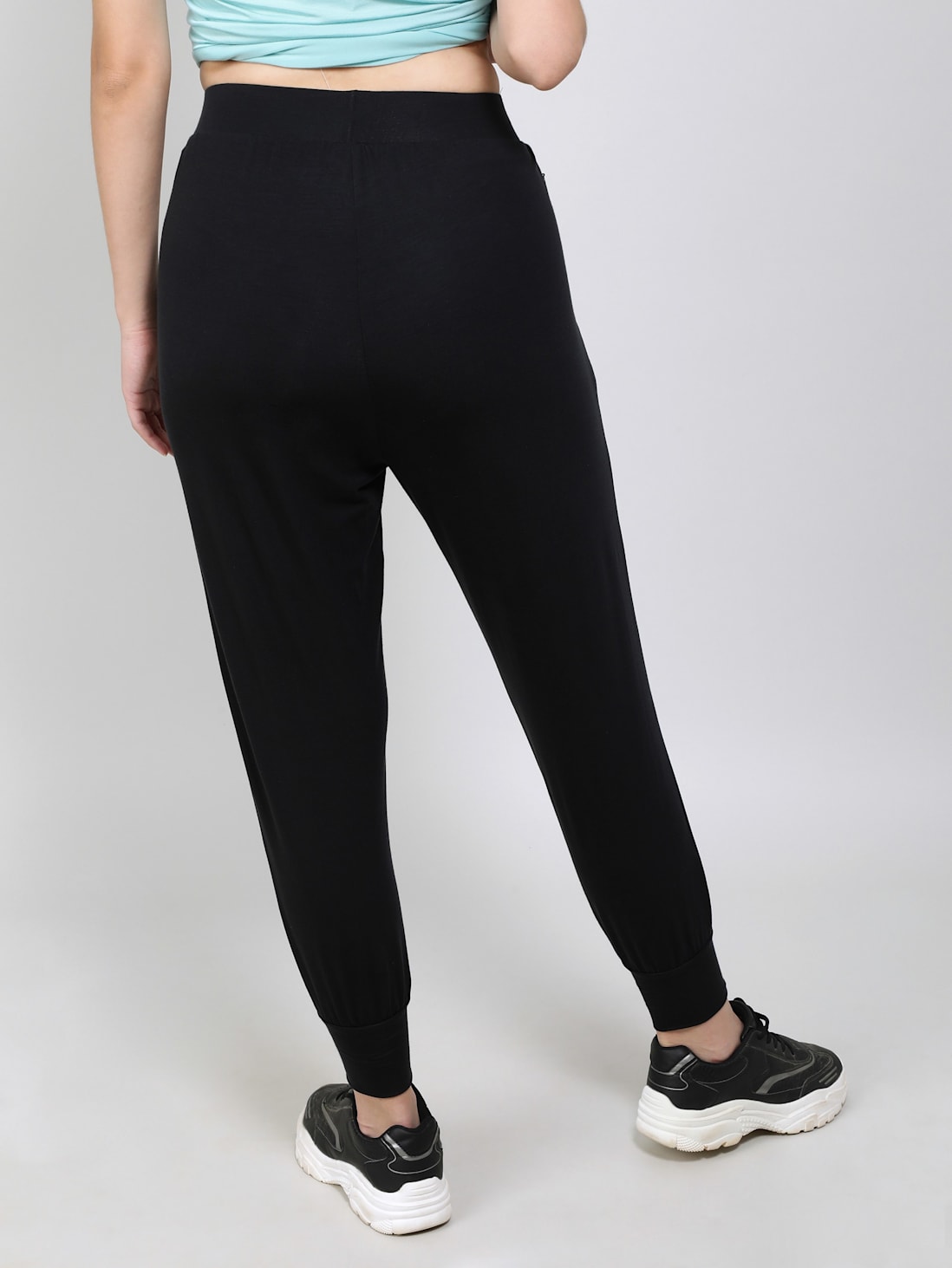Jockey half zip and leggings with adidas sneakers for an athleisure outfit